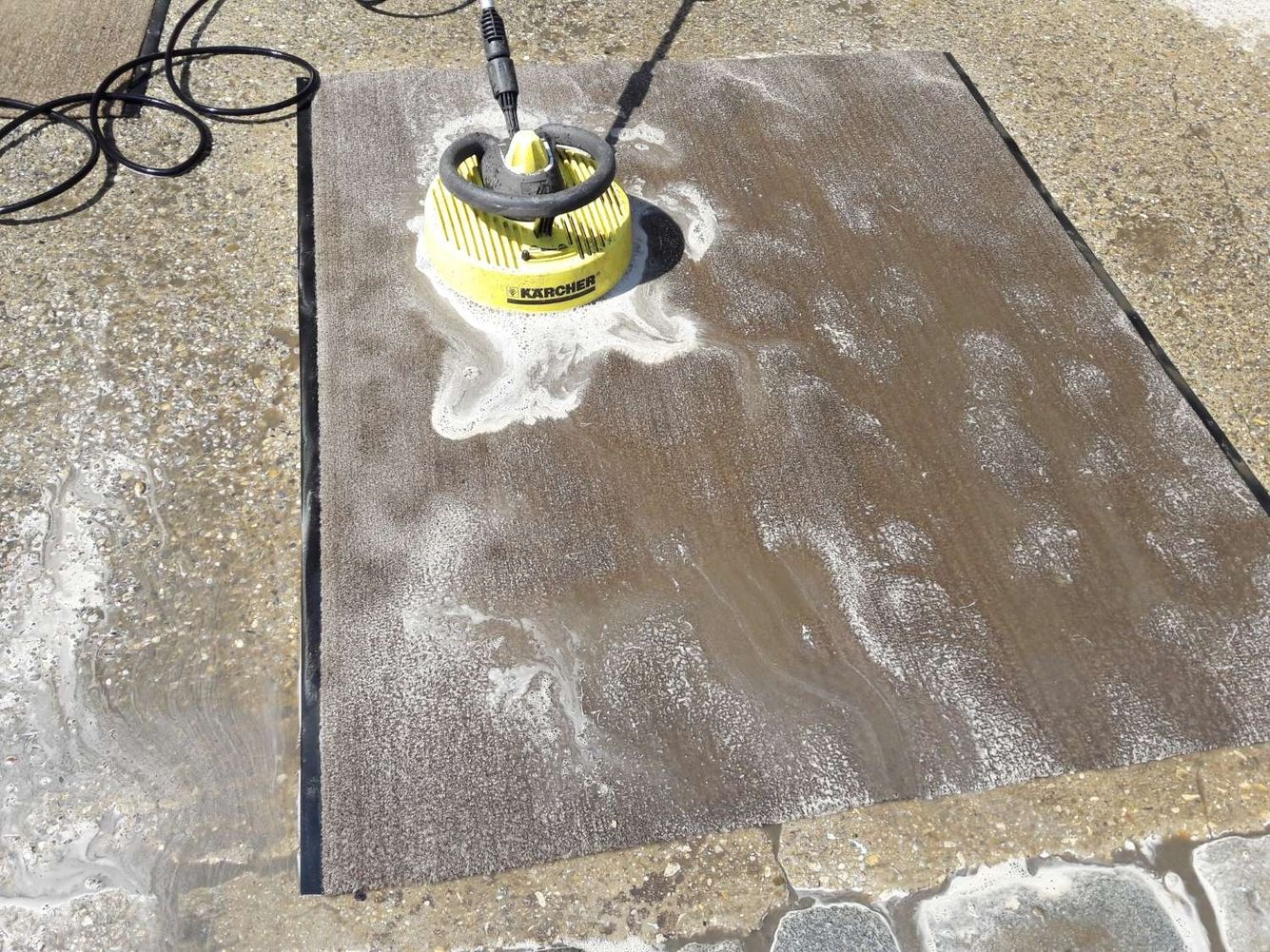 Reinigung einer Schmutzfangmatte